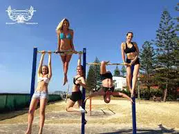 girls in bikinis performing Calisthenics